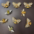 Spille Smaltate in Ottone con Swarovski – Tema Api